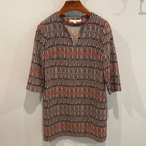 Boden dress with beige background and navy, light blue and red accents